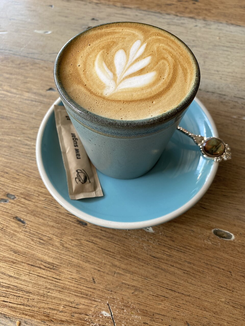 A flat white with latte art